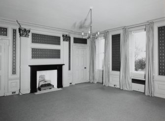 Interior. Ground floor View of the Central Saloon from NE showing 18th century paneling, giant corinthian pilasters and early 19th century fireplace