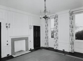 Interior. Ground floor View of the Library from NE showing 18th century fireplace and panelling