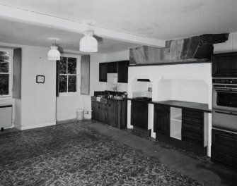Interior. Lower ground floor View of Kitchen from SE showing original fireolce