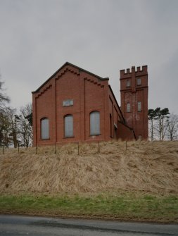 View from ENE of E end of Filter House, also showing water tower.