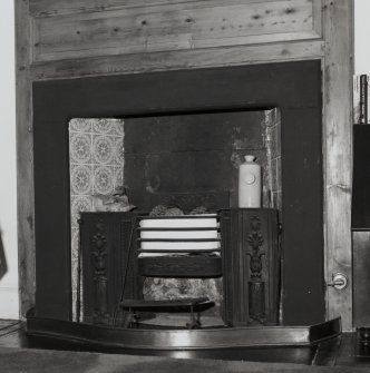 Interior. Detail of ground floor bedroom fireplace with hob grate