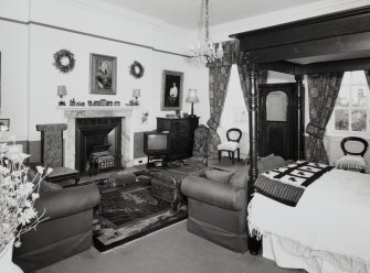 Interior. View of first floor master bedroom from W