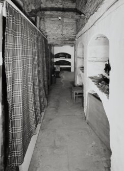 Interior. Detail of basement wine bins