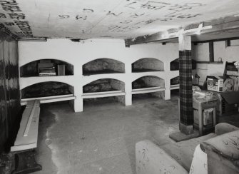 Interior. Detail of basement wine bins