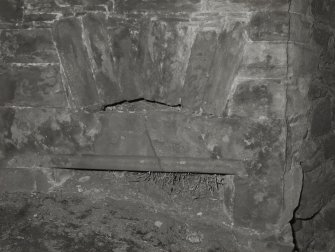 Interior.
Detail of fireplace in W wall of tower chamber.