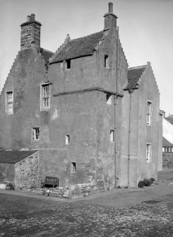 View showing low crow-stepped gable and an 18th century addition