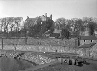 General view of Rossend Castle from south east, taken from railway tracks by Sailor's Walk