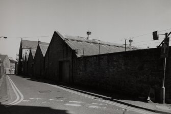 View from E of NW side of works, fronting onto Douglas Street