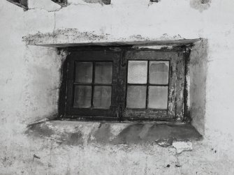 Exchange Street building. Interior.
Detail of typical window on Second floor of West half of block. Wooden framed, each half contains four panes. (Opening/casement is 1.4m wide by 0.82 high). The windows are all barred.