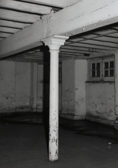 Exchange Street Building. Interior.
Detail of round cast-iron column in West half of block on first floor. The columns have cast-iron saddles for beams, and are 0.13m dia at 3.25m centres.