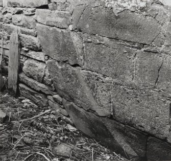 Detail of ashlar stonework of water wheel pit, bearing marks from water wheel