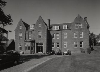 Trust Offices. View of front from SE