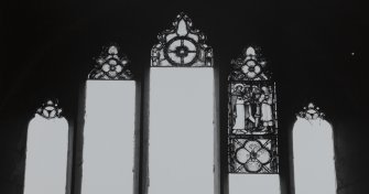 Interior.
Remains of stained glass windows. South gable.