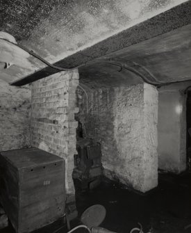 Interior. View of cellars in South-West rear block.