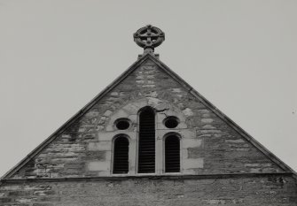 Detail of gable apex and finial on South frontage.