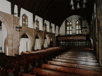 Interior.  View of aisle and pews.
