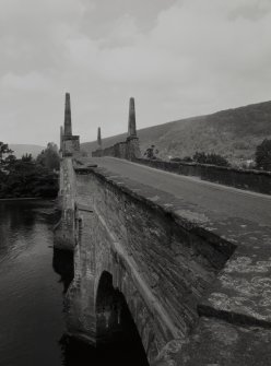 View from E of road over bridge showing four obelisks