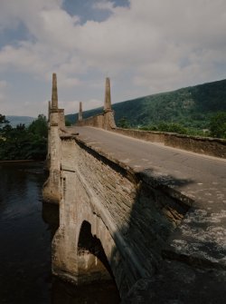 View from E of road over bridge showing four obelisks