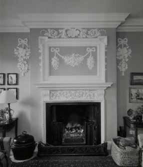 Interior. SE wing. Ground floor parlour. Detail of fireplace
