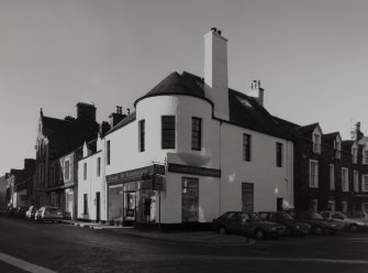 General view of 1 Dunira Street, Comrie, showing the premises of Brough and Macpherson from SE.