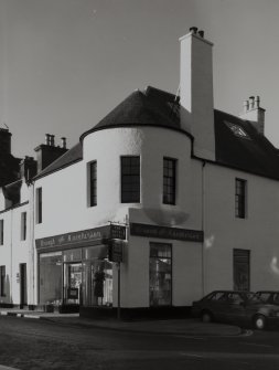 View of 1 Dunira Street, Comrie, showing the premises of Brough and Macpherson from SE.