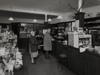 Interior view of 1 Dunira Street, Comrie, showing the shop of Brough and Macpherson from S.