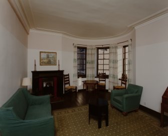 Interior view of 1 Dunira Street, Comrie, showing living room in first floor flat.