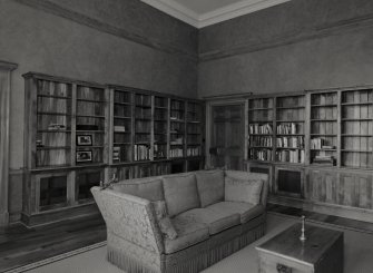 Interior. View of first floor library from South East showing bookcases