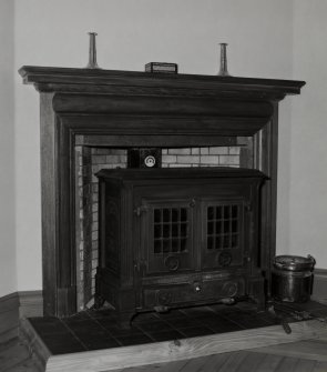 Interior. First floor Edwardian bedroom, detail of fireplace