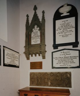 Interior, entrance lobby, detail of memorial plaques to past ministers and sculpyural fragment
