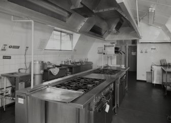 Interior view of sergeants mess, showing kitchen ranges and equipment