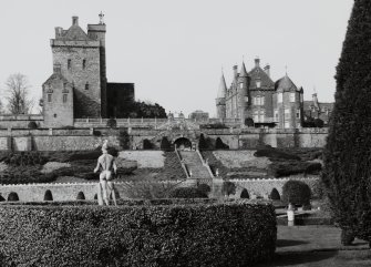 View of keep, house, garden terrace and stone staircase from formal garden to South.