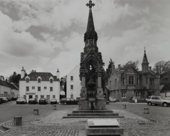 View from E showing the Cross, Monument to the 6th Duke of Atholl