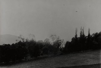 Distant view through trees from Photograph Album No 31, Lochend Album.