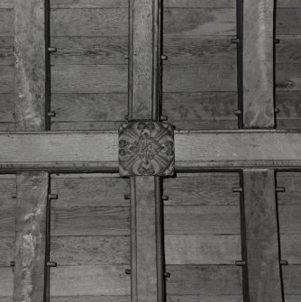 Interior. Detail of roof structure showing pegging and ornamental boss