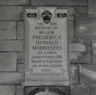 Interior. Detail of memorial at W end to F D Mirrielees of Garth d.17th August 1940