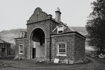 View of gatehouse and archway to courtyard from SW