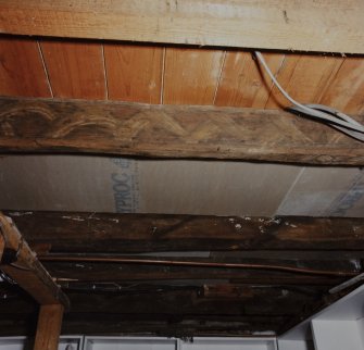 Kinross, 75 High Street, interior.
Detail of 17th century painted beam in North basement room.