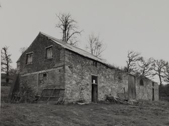 Lynedoch Cottage, outbuildings.
General view from South-West of Barn/byre showing brick infill in gable and semicircle ventilation opening.