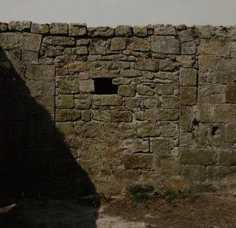 Interior of West wall, view from East.