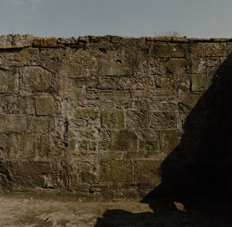 Interior of East wall, view from West.