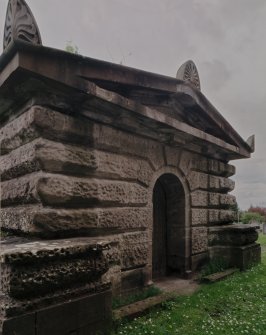 Oblique view of Mausoleum frontage from NE showing pediment and decorative stone work