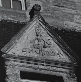Detail of dormer pediment on old house.