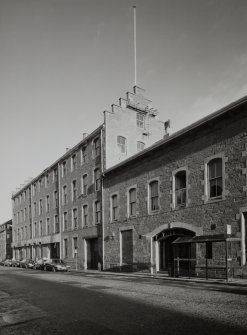 Perth, 1 Mill Street, Pullar's Dyeworks
View from south west of four-storeyed (and attic) block with crow-stepped gables, occupying north west corner of the works