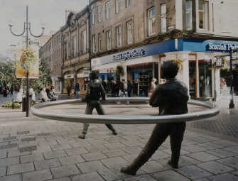 View from W at junction with King Edward Street showing public sculptures.