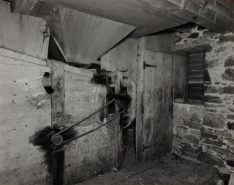 Interior.
Detail of threshing machine.