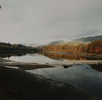 General view of partially drained Loch Faskally from SE