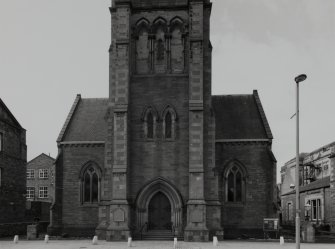 View from E showing body of church and first stage of tower