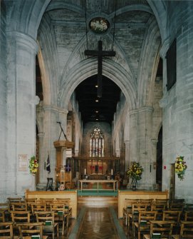 Interior. Nave and crossing. View from W