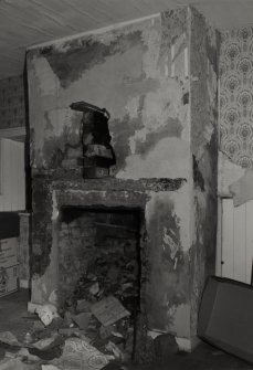Interior.
Detail of fireplace at foot of lumb.